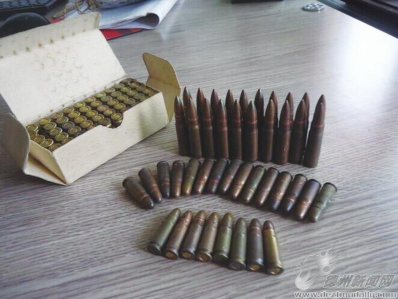 拆旧房刨出93枚子弹